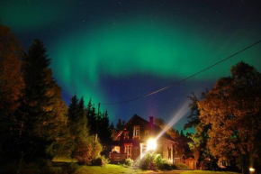 100 Years Old Norwegian Log House in Tromsø